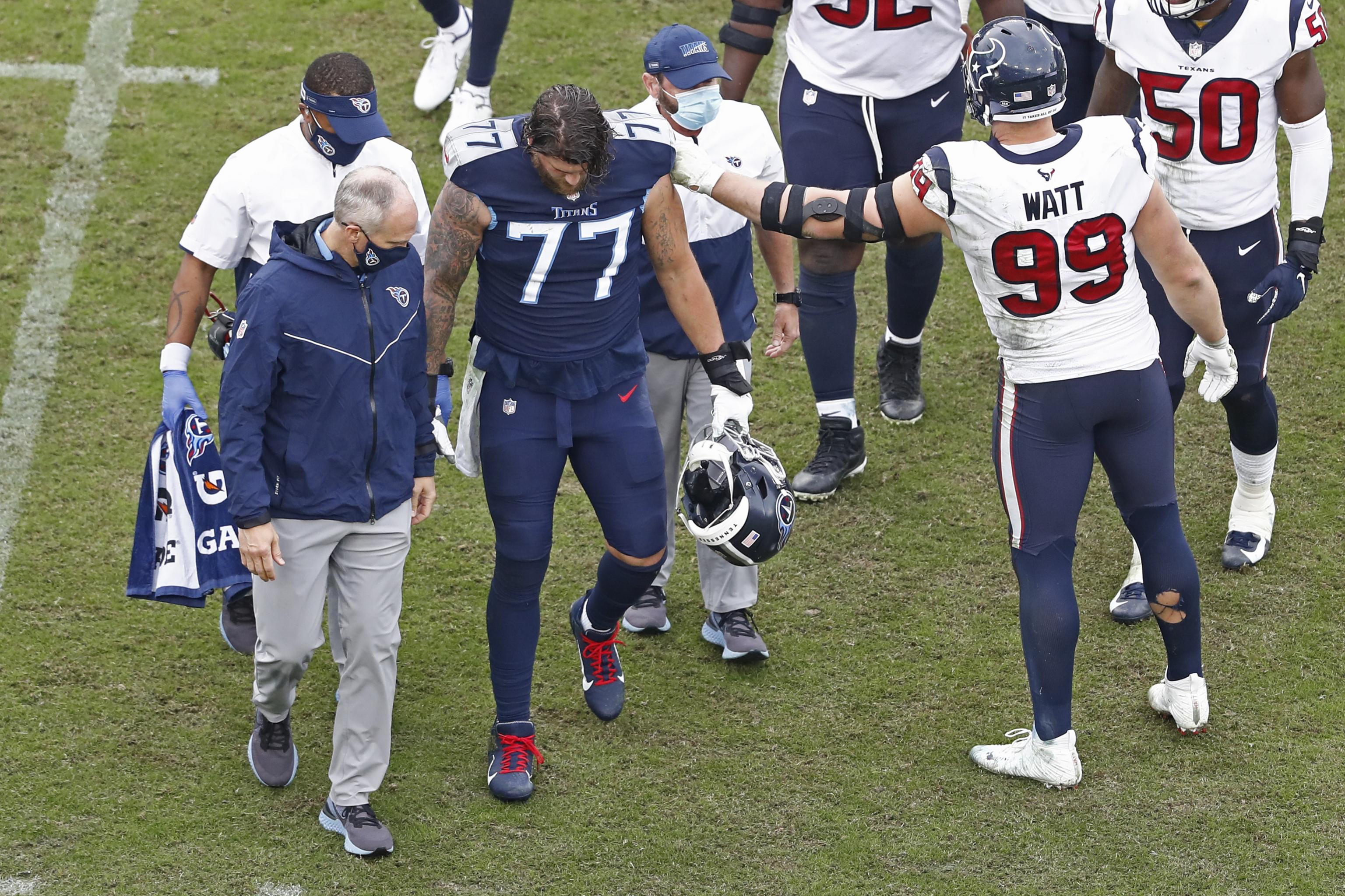 Titans left tackle Taylor Lewan confirms he tore his ACL