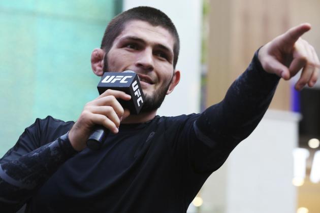 Russian UFC fighter Khabib Nurmagomedov gestures to the crowd during an open training session at Yas Mall in Abu Dhabi, United Arab Emirates, Wednesday, Sept. 4, 2019. Fighters Dustin Poirier and Khabib Nurmagomedov will face each other in UFC 242, which will be held Saturday, Sept. 7, 2019, in Abu Dhabi. Nurmagomedov did not spar during the open training, saying he was still trying to make weight for the bout. (AP Photo/Jon Gambrell)