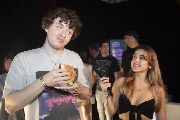 IMAGE DISTRIBUTED FOR PAPA JOHN'S PIZZA - Hip Hop artist Jack Harlow, trying the new Papa John's Papadias at Shaq's Fun House on Friday, Jan. 31, 2020 in Miami. (Manuel Mazzanti/AP Images for Papa John's Pizza)