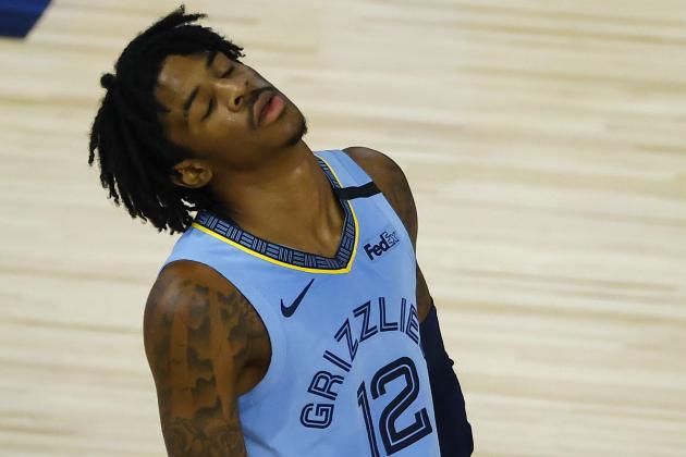 Memphis Grizzlies' Ja Morant reacts after a losing to the Portland Trail Blazers in an NBA basketball game Saturday, Aug. 15, 2020, in Lake Buena Vista, Fla. (Kevin C. Cox/Pool Photo via AP)
