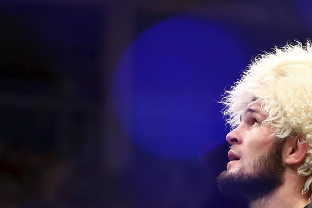 Russian UFC fighter Khabib Nurmagomedov speaks after wining against UFC fighter Dustin Poirier, of Lafayette, La., during Lightweight title mixed martial arts bout at UFC 242, in Yas Mall in Abu Dhabi, United Arab Emirates, early Sunday, Sept.8 2019. (AP Photo/ Mahmoud Khaled)