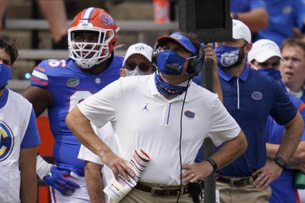Florida head coach Dan Mullen looks at the scoreboard during the second half of an NCAA college football game against South Carolina, Saturday, Oct. 3, 2020, in Gainesville, Fla. (AP Photo/John Raoux,Pool)