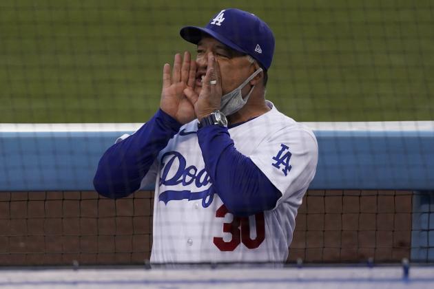 Los Angeles Dodgers manager Dave Roberts yells from the dugout before a baseball game against the Los Angeles Angels, Saturday, Sept. 26, 2020, in Los Angeles. (AP Photo/Ashley Landis)