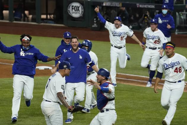 Los Angeles Dodgers celebrate after defeating the Tampa Bay Rays 3-1 to win the baseball World Series in Game 6 Tuesday, Oct. 27, 2020, in Arlington, Texas. (AP Photo/Tony Gutierrez)