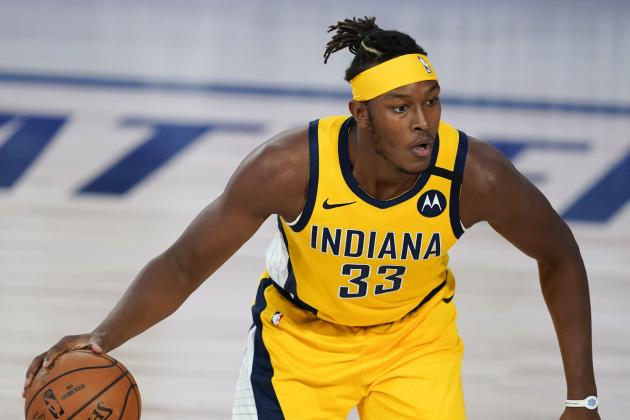 Indiana Pacers' Myles Turner (33) makes his way down the court during an NBA basketball game against the Orlando Magic Tuesday, Aug. 4, 2020, in Lake Buena Vista, Fla. (AP Photo/Ashley Landis, Pool)
