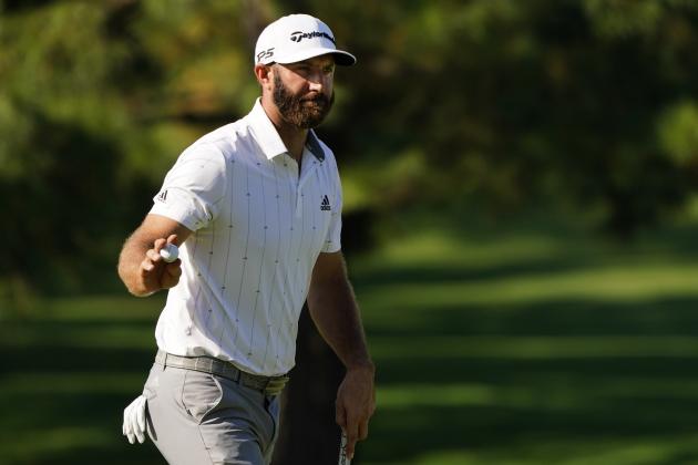 Dustin Johnson waves his ball after a birdie on the seventh hole during the third round of the Masters golf tournament Saturday, Nov. 14, 2020, in Augusta, Ga. (AP Photo/Matt Slocum)