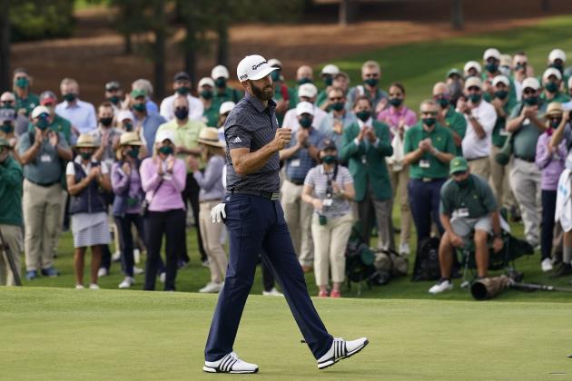 Dustin Johnson celebrates after winning the Masters golf tournament Sunday, Nov. 15, 2020, in Augusta, Ga. (AP Photo/David J. Phillip)