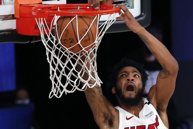 Miami Heat's Derrick Jones Jr. dunks against the Oklahoma City Thunder during the second half of an NBA basketball game Wednesday, Aug. 12, 2020, in Lake Buena Vista, Fla. (Kevin C. Cox/Pool Photo via AP)