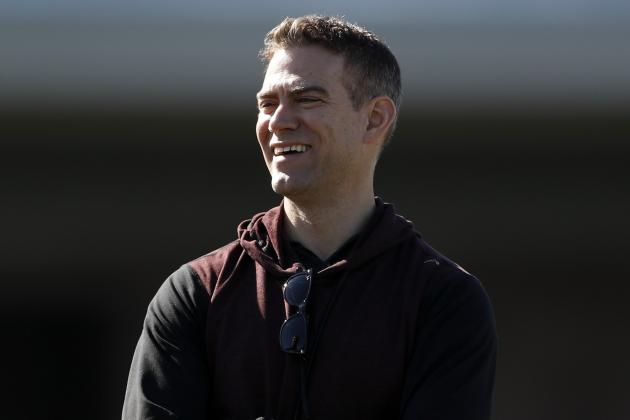 Chicago Cubs president of baseball operations Theo Epstein looks on during a spring training baseball workout Wednesday, Feb. 12, 2020, in Mesa, Ariz. (AP Photo/Gregory Bull)