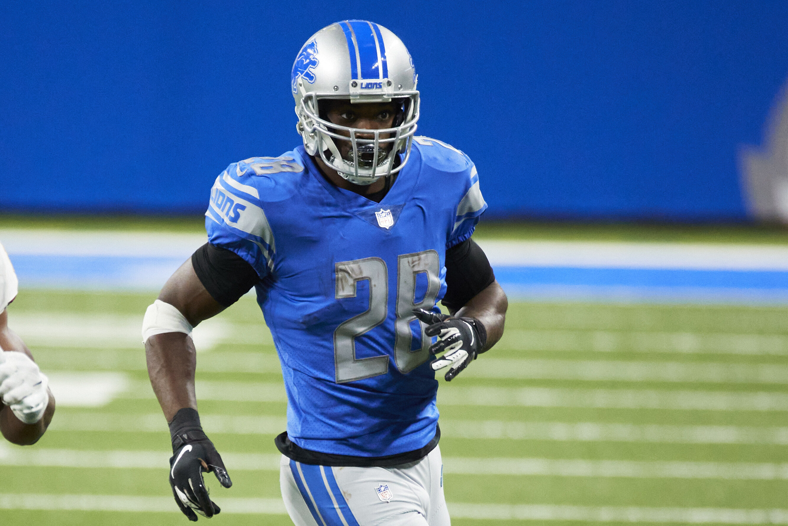 Adrian Peterson of the Detroit Lions leaves the field following a