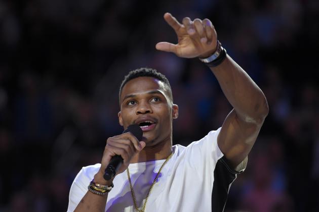 Former UCLA basketball player and current player for the Oklahoma Thunder Russell Westbrook speaks to the crowd after being honored with a basketball court named after him following the first half of an NCAA college basketball game between UCLA and Arizona, Thursday, Jan. 7, 2016, in Los Angeles. (AP Photo/Mark J. Terrill)