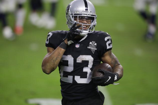 Las Vegas Raiders running back Devontae Booker (23) celebrates after scoring a touchdown against the Denver Broncos during the second half of an NFL football game, Sunday, Nov. 15, 2020, in Las Vegas. (AP Photo/Isaac Brekken)