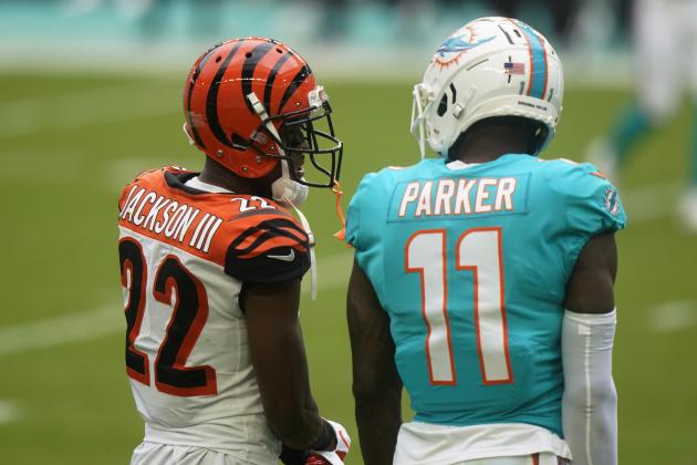 Cincinnati Bengals cornerback William Jackson (22) talks to Miami Dolphins wide receiver DeVante Parker (11) during the first half of an NFL football game, Sunday, Dec. 6, 2020, in Miami Gardens, Fla. (AP Photo/Wilfredo Lee)