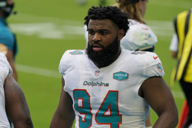 Miami Dolphins defensive tackle Christian Wilkins (94) walks the sidelines, during the second half of an NFL football game against the Buffalo Bills, Sunday, Sept. 20, 2020 in Miami Gardens, Fla. (AP Photo/Wilfredo Lee)