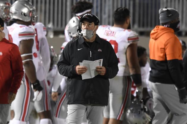 Ohio State coach Ryan Day looks at the scoreboard during the third quarter of the team's NCAA college football game against Penn State in State College, Pa., Saturday, Oct. 31, 2020. Ohio State won 38-25. (AP Photo/Barry Reeger)