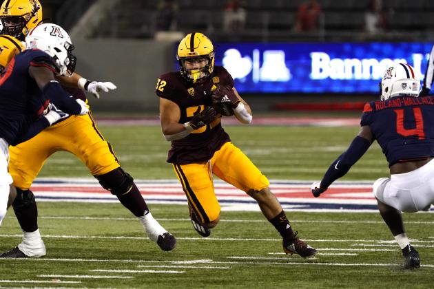 Arizona State running back Jackson He (32) runs the football in the second half during an NCAA college football game against Arizona, Friday, Dec. 11, 2020, in Tucson, Ariz. (AP Photo/Rick Scuteri)