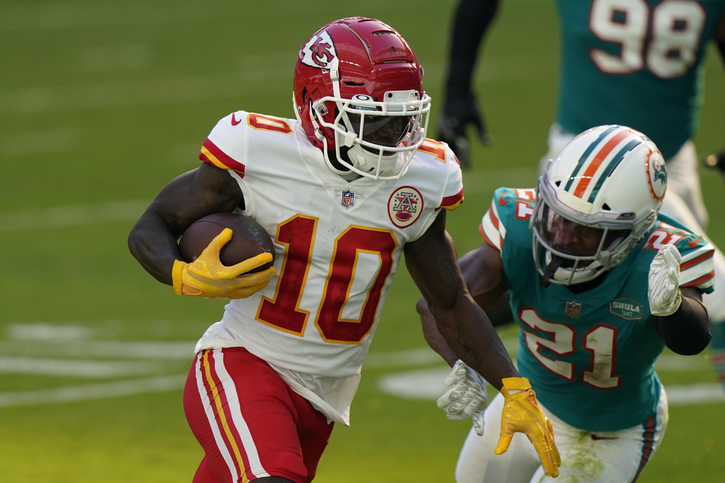 Chiefs survive 3 Patrick Mahomes interceptions, Tua Tagovailoa rally to top  Dolphins, clinch AFC West