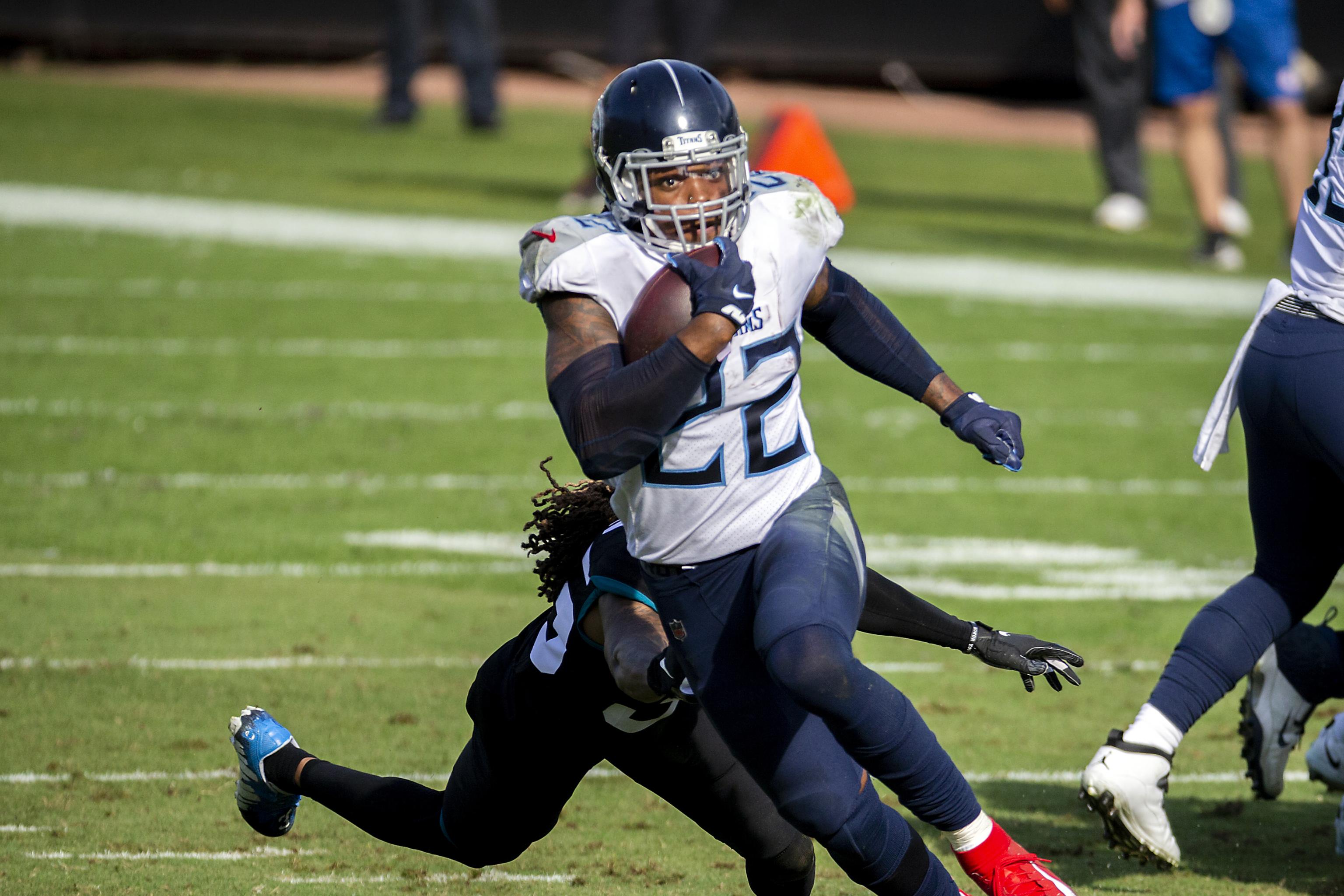 Henry runs for 215 yards, Titans beat Jaguars, 31-10