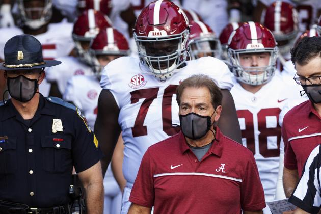 FILE - In this Sept. 26, 2020, file photo, Alabama coach Nick Saban leads his team to the field before an NCAA college football game against Missouri in Columbia, Mo. Alabama is No. 1 in The Associated Press college football poll for the first time this year, extending its record of consecutive seasons with at least one week on top of the rankings to 13. (AP Photo/L.G. Patterson, File)