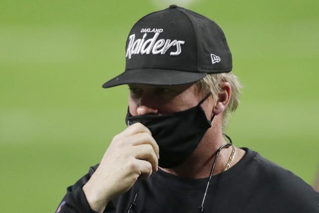 Las Vegas Raiders head coach Jon Gruden wears an Oakland Raiders hat before an NFL football game against the Los Angeles Chargers, Thursday, Dec. 17, 2020, in Las Vegas. (AP Photo/Isaac Brekken)