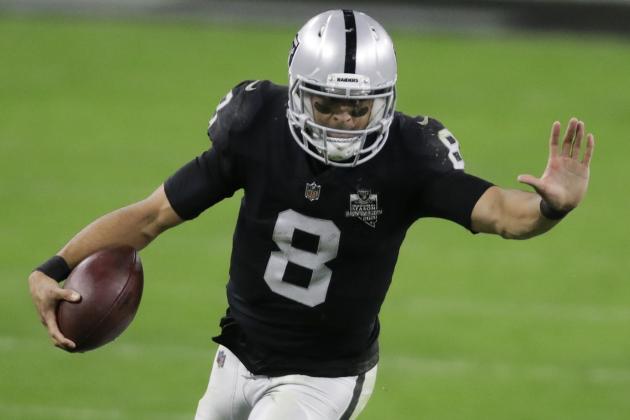 Las Vegas Raiders quarterback Marcus Mariota (8) runs agains Los Angeles Chargers in overtime of an NFL football game, Thursday, Dec. 17, 2020, in Las Vegas. (AP Photo/Isaac Brekken)