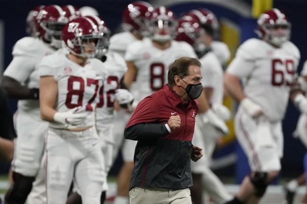 Alabama head coach Nick Saban runs on the field before the first half of the Southeastern Conference championship NCAA college football game between Florida and Alabama, Saturday, Dec. 19, 2020, in Atlanta. (AP Photo/John Bazemore)