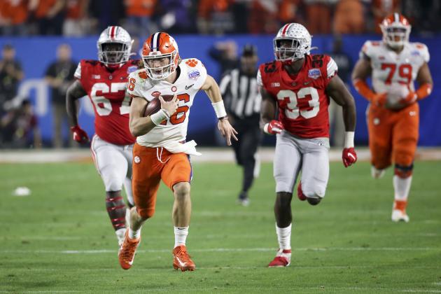 Clemson quarterback Trevor Lawrence runs for a touchdown against Ohio State during the first half of the Fiesta Bowl NCAA college football playoff semifinal Saturday, Dec. 28, 2019, in Glendale, Ariz. (AP Photo/Ross D. Franklin)