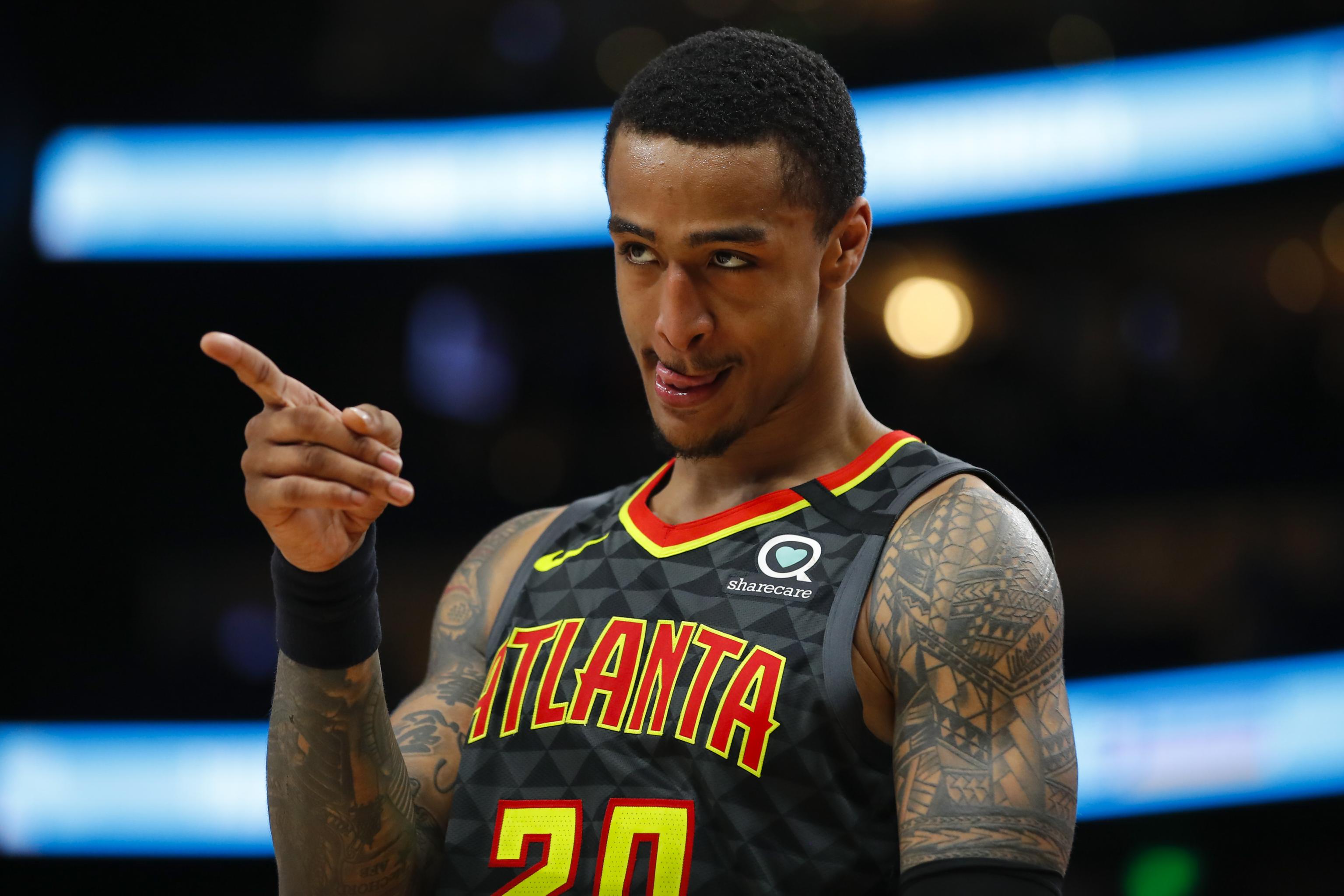 Hawks big man John Collins is grateful for the sacrifices of his military  mom - Sports Illustrated
