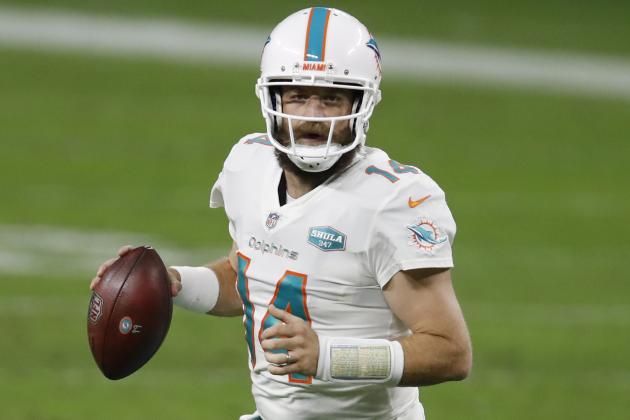 Miami Dolphins quarterback Ryan Fitzpatrick (14) looks to throw a pass against the Las Vegas Raiders during an NFL football game, Saturday, Dec. 26, 2020, in Las Vegas.The Dolphins won the game 26-25. (Jeff Haynes/AP Images for Panini)