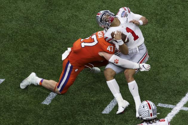 Ohio State quarterback Justin Fields gets hit by Clemson linebacker James Skalski during the first half of the Sugar Bowl NCAA college football game Friday, Jan. 1, 2021, in New Orleans. Skalski was ejected from the game for targeting. (AP Photo/Butch Dill) Ohio State quarterback Justin Fields gets hit by Clemson linebacker James Skalski during the first half of the Sugar Bowl NCAA college football game Friday, Jan. 1, 2021, in New Orleans. Skalski was ejected from the game for targeting. (AP Photo/Butch Dill)
