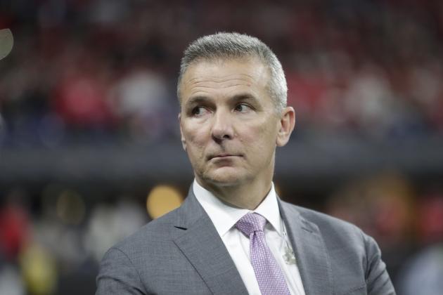 Former Ohio State head coach Urban Meyer watches during the second half of the Big Ten championship NCAA college football game between Ohio State and Wisconsin, Saturday, Dec. 7, 2019, in Indianapolis. (AP Photo/Michael Conroy)