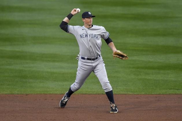 New York Yankees second baseman DJ LeMahieu fields a groundout by Toronto Blue Jays' Teoscar HernÃ¡ndez during the first inning of a baseball game in Buffalo, N.Y., Tuesday, Sept. 22, 2020. (AP Photo/Adrian Kraus)