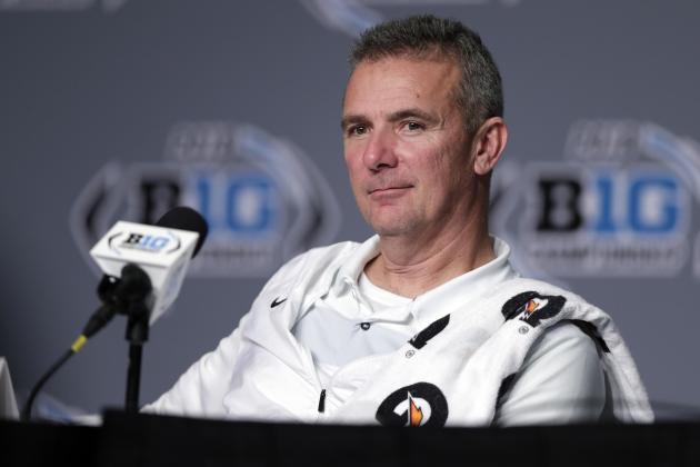 FILE - In this Dec. 2, 2018, file photo, Ohio State head coach Urban Meyer takes part in a news conference following the Big Ten championship NCAA college football game against Northwestern, in Indianapolis. Ohio State says Urban Meyer will retire after the Rose Bowl and assistant Ryan Day will be the next head coach. After seven years and a national championship at Ohio State, the 54-year-old Meyer will formally announce his departure Tuesday, Dec. 4, 2018, at a news conference.  (AP Photo/Michael Conroy, File)