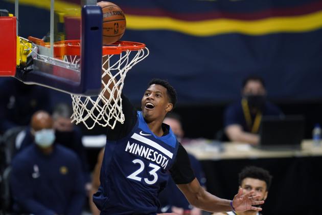 Minnesota Timberwolves guard Jarrett Culver scores against the Denver Nuggets during the second half of an NBA basketball game Tuesday, Jan. 5, 2021, in Denver. (AP Photo/David Zalubowski)
