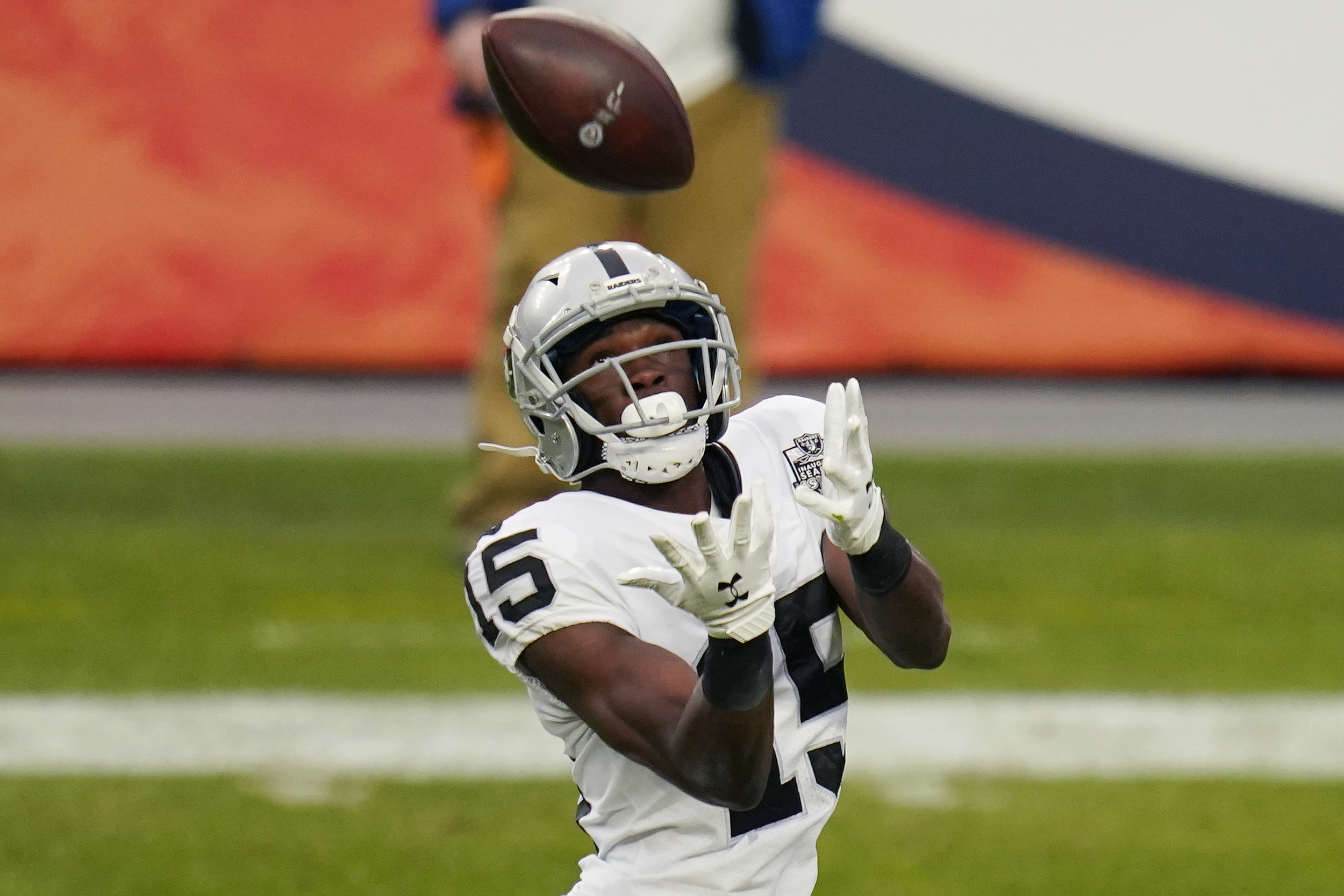 Las Vegas Raiders wide receiver Nelson Agholor (15) celebrates his  touchdown with tight end Dar …