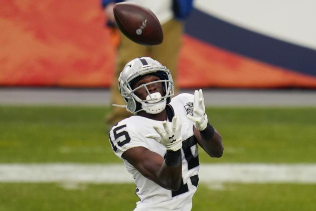 Las Vegas Raiders wide receiver Nelson Agholor (15) catches a pass against the Denver Broncos during the first half of an NFL football game, Sunday, Jan. 3, 2021, in Denver. (AP Photo/Jack Dempsey)