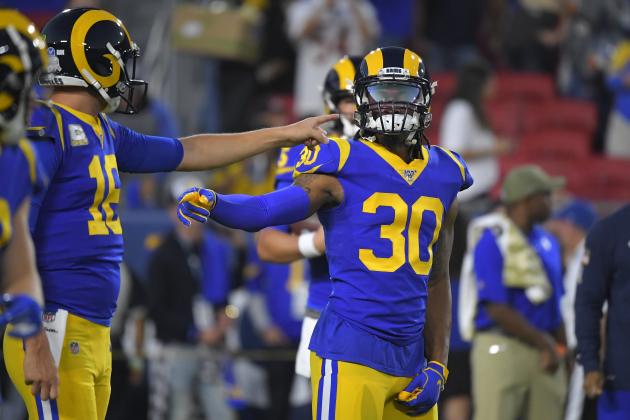 Los Angeles Rams quarterback Jared Goff, left, and running back Todd Gurley talks prior to an NFL football game against the Chicago Bears Sunday, Nov. 17, 2019, in Los Angeles. (AP Photo/Mark J. Terrill)