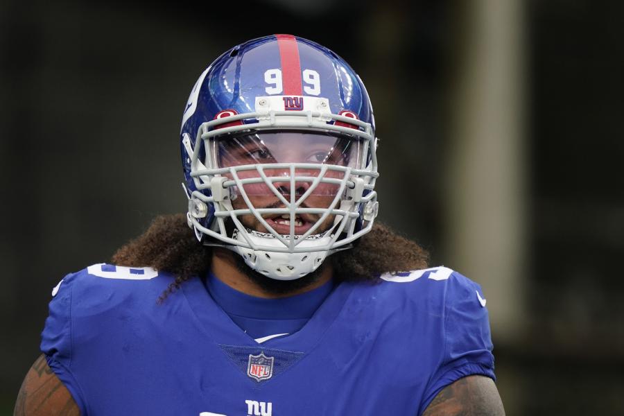 New York Giants defensive end Leonard Williams (99) takes the field to face  the Carolina Panthers in an NFL football game, Sunday, Oct. 24, 2021, in  East Rutherford, N.J. (AP Photo/Adam Hunger