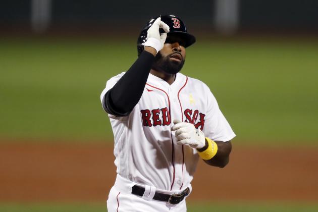 Boston Red Sox's Jackie Bradley Jr. celebrates his two-run home run during the second inning of a baseball game against the Toronto Blue Jays, Saturday, Sept. 5, 2020, in Boston. (AP Photo/Michael Dwyer)