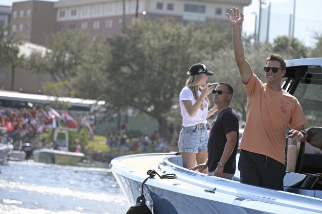 Tampa Bay Buccaneers NFL football quarterback Tom Brady waves to fans as he celebrates their Super Bowl 55 victory over the Kansas City Chiefs with a boat parade in Tampa, Fla., Wednesday, Feb. 10, 2021. (AP Photo/Phelan Ebenhack) Tampa Bay Buccaneers NFL football quarterback Tom Brady waves to fans as he celebrates their Super Bowl 55 victory over the Kansas City Chiefs with a boat parade in Tampa, Fla., Wednesday, Feb. 10, 2021. (AP Photo/Phelan Ebenhack)