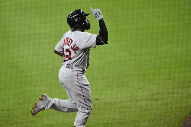 Boston Red Sox's Jackie Bradley Jr. celebrates as he runs the third base line before scoring on the Atlanta Braves during a baseball game Friday, Sept. 25, 2020, in Atlanta. (AP Photo/John Amis)