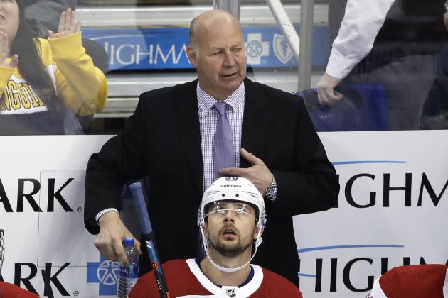 Montreal Canadiens head coach Claude Julien stands behind his bench during the first period of an NHL hockey game against the Pittsburgh Penguins in Pittsburgh, Friday, Feb. 14, 2020. The Penguins won 4-1. (AP Photo/Gene J. Puskar)