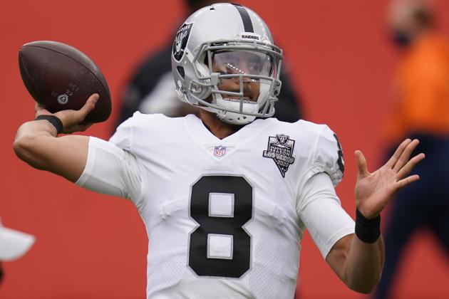 Las Vegas Raiders quarterback Marcus Mariota (8) in the first half of an NFL football game Sunday, Jan. 3, 2021, in Denver. (AP Photo/David Zalubowski)