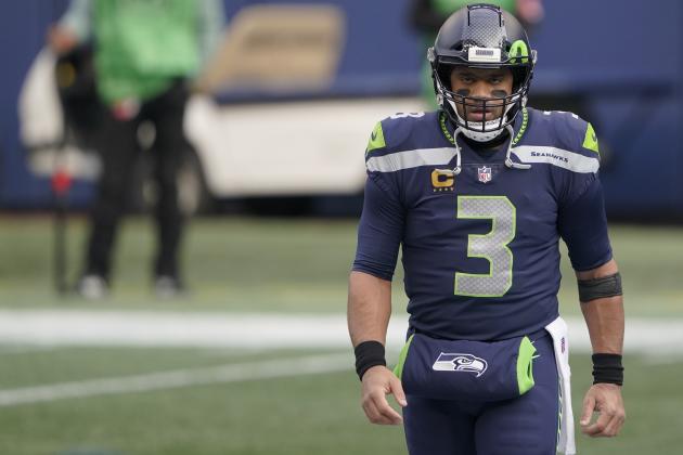 Seattle Seahawks quarterback Russell Wilson (3) walks on the field before an NFL wild-card playoff football game against the Los Angeles Rams, Saturday, Jan. 9, 2021, in Seattle. (AP Photo/Ted S. Warren) Seattle Seahawks quarterback Russell Wilson (3) walks on the field before an NFL wild-card playoff football game against the Los Angeles Rams, Saturday, Jan. 9, 2021, in Seattle. (AP Photo/Ted S. Warren)