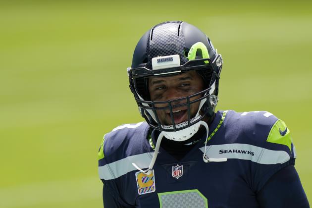 Seattle Seahawks quarterback Russell Wilson (3) walks back to the sidelines during the first half of an NFL football game against the Miami Dolphins, Sunday, Oct. 4, 2020 in Miami Gardens, Fla. (AP Photo/Wilfredo Lee)