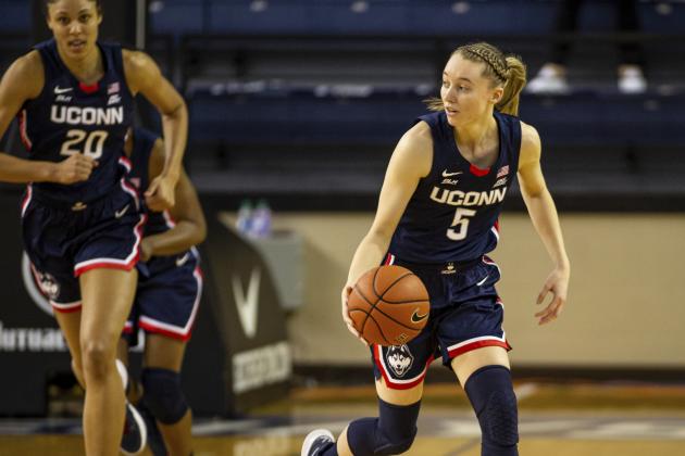 Connecticut guard Paige Bueckers (5) dribbles downcourt against Creighton in the first quarter during an NCAA college basketball game Thursday, Feb. 25, 2021, in Omaha, Neb. (AP Photo/John Peterson)