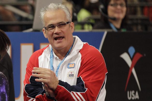 FILE - In this March 3, 2012, file photo, gymnastics coach John Geddert is seen at the American Cup gymnastics meet at Madison Square Garden in New York. Geddert, a former U.S. women's gymnastics national team coach, is facing a criminal investigation in Michigan after the sentencing of disgraced ex-sports doctor Larry Nassar, who treated girls at his elite club Twistars near Lansing. The Eaton County Sheriff’s Office said Tuesday, Feb. 6, 2018, people have recently come forward with complaints against Geddert. (AP Photo/Kathy Willens, File)