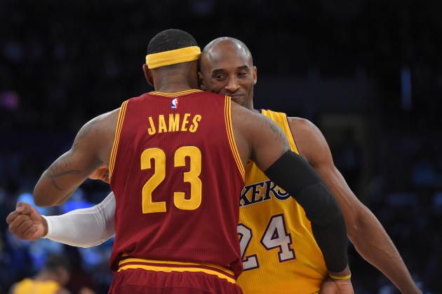 Cleveland Cavaliers forward LeBron James, left, and Los Angeles Lakers guard Kobe Bryant hug prior to an NBA basketball game, Thursday, Jan. 15, 2015, in Los Angeles. (AP Photo/Mark J. Terrill)