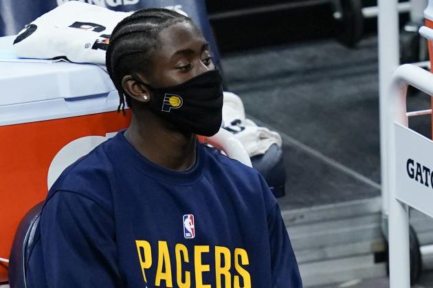 Indiana Pacers' Caris LeVert watches from the bench during the first half of an NBA basketball game against the Dallas Mavericks, Wednesday, Jan. 20, 2021, in Indianapolis. (AP Photo/Darron Cummings)
