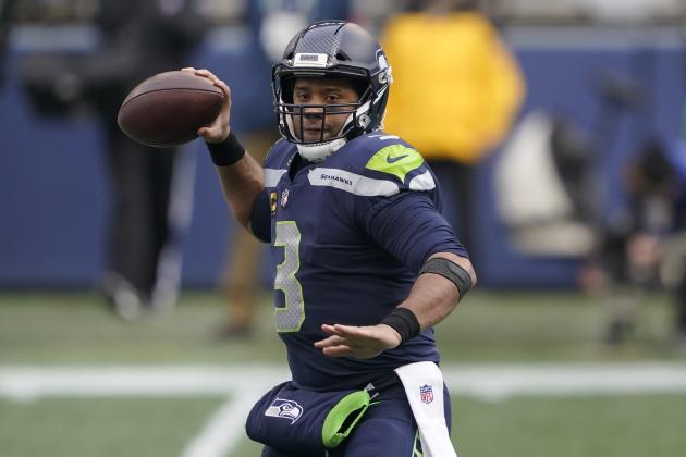 Seattle Seahawks quarterback Russell Wilson (3) in action against the Los Angeles Rams during an NFL wild-card playoff football game, Saturday, Jan. 9, 2021, in Seattle. (AP Photo/Ted S. Warren) Seattle Seahawks quarterback Russell Wilson (3) in action against the Los Angeles Rams during an NFL wild-card playoff football game, Saturday, Jan. 9, 2021, in Seattle. (AP Photo/Ted S. Warren)